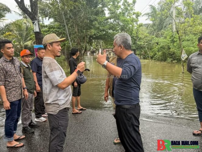 
					Pasca Hujan Deras Guyur Pekanbaru, Wako Agung Tinjau Wilayah Banjir