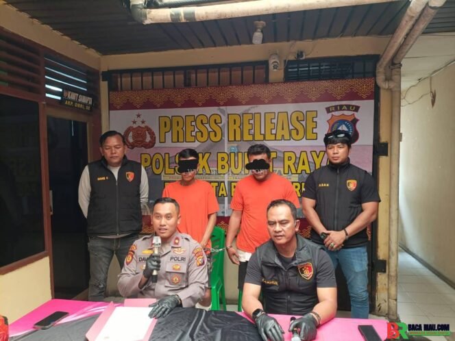 
					Tim Opsnal Polsek Bukit Raya Ringkus Dua Pria Pelaku Pecah Kaca, Pelaku Ditembak 