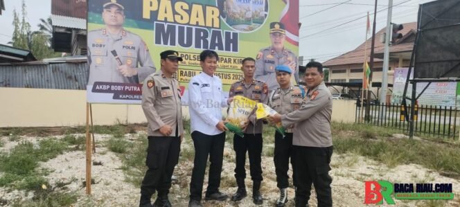 
					Polsek Kampar Kiri Gelar Pasar Murah, Sentuhan Hati Polri Ringankan Beban Ekonomi Masyarakat   