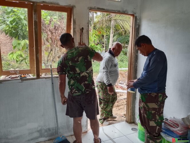 
					Pembangunan RTLH Ibu Anismar Capai 89 Persen, Satgas TMMD ke-127 Kodim 0301/Pekanbaru Percepat Tahap Penyelesaian