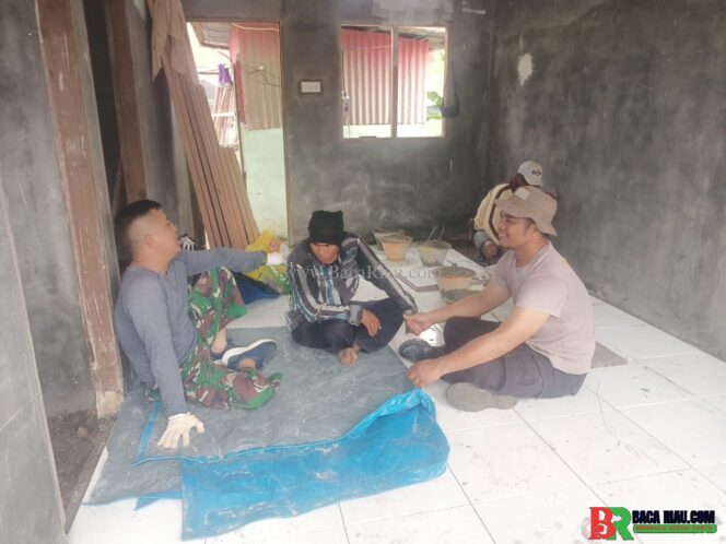 
					Tawa di Sela Pekerjaan, Bukti Kekompakan Satgas TMMD ke-127 Bersama Warga Tenayan Raya